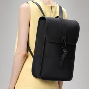Rains Black Minimalist Backpack with Flap Closure
